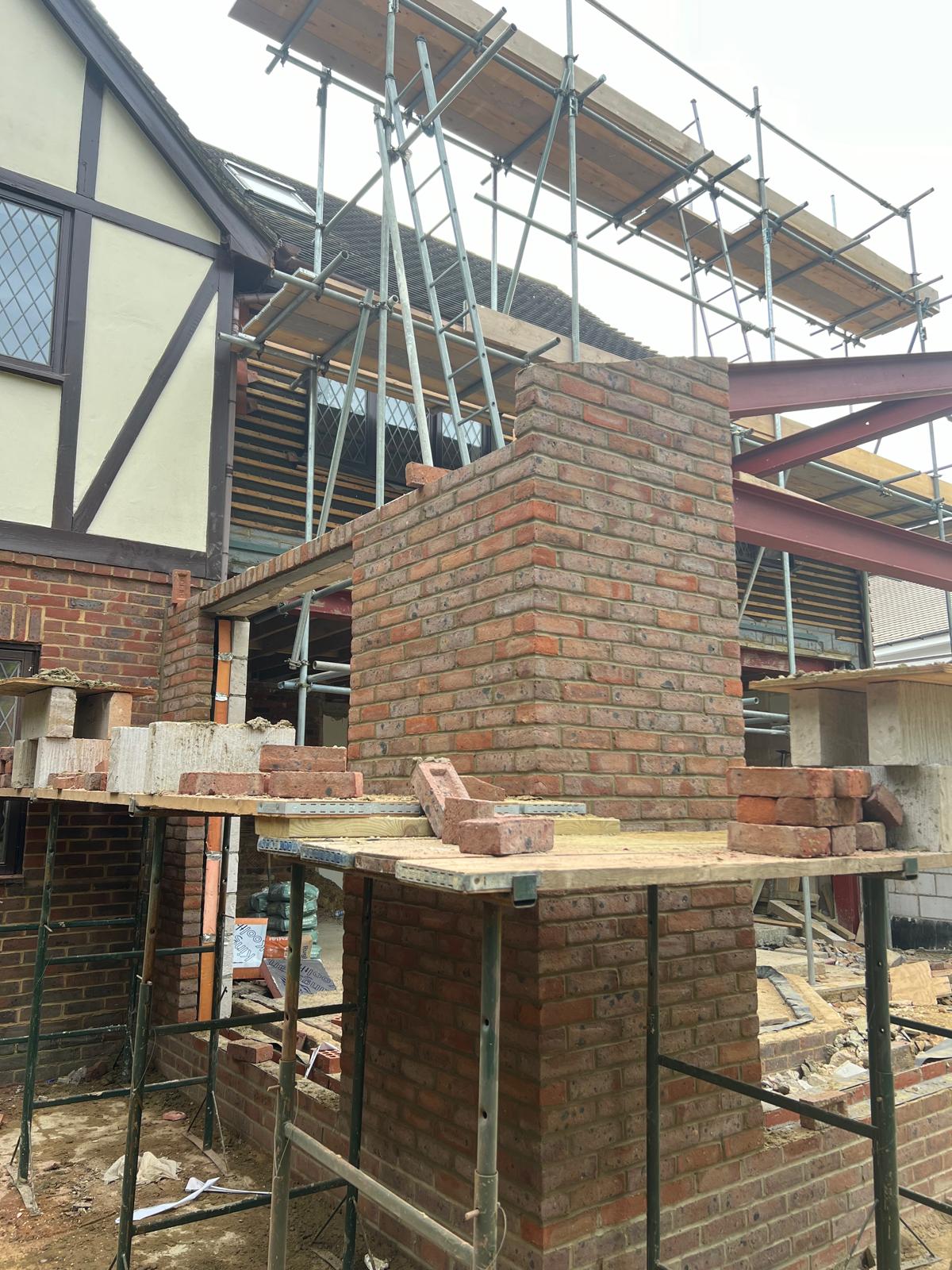 Detailed brick chimney column close up during construction