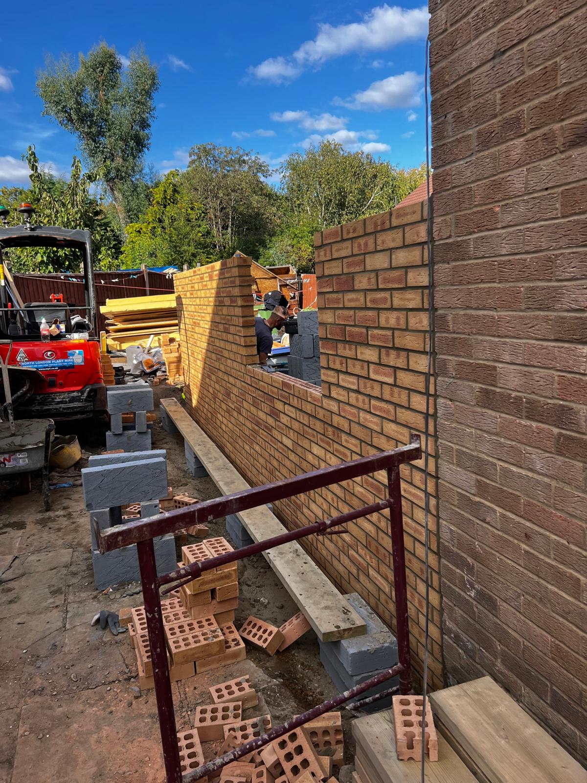 Sunny corner red brick garden extension build