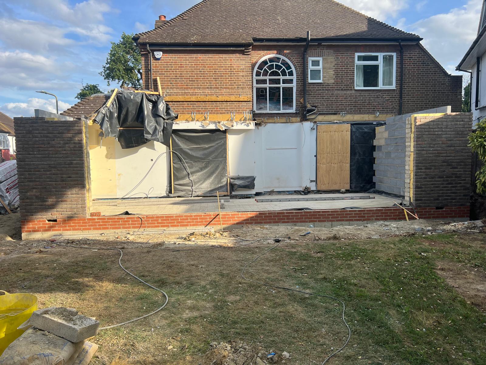 Rear extension brick base completed with steel frame above